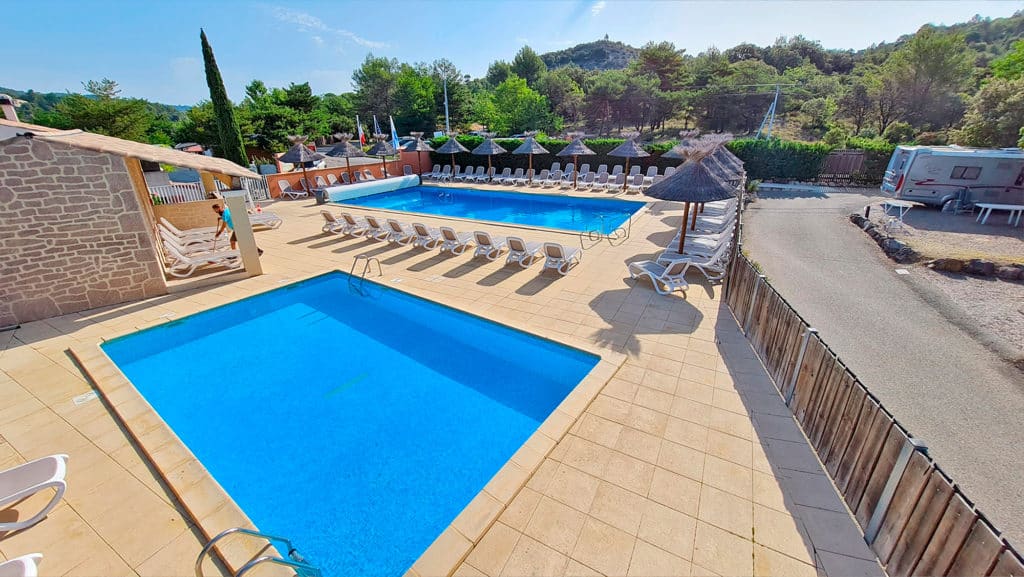 View of the heated pools at Camping La Pinède in Verdon